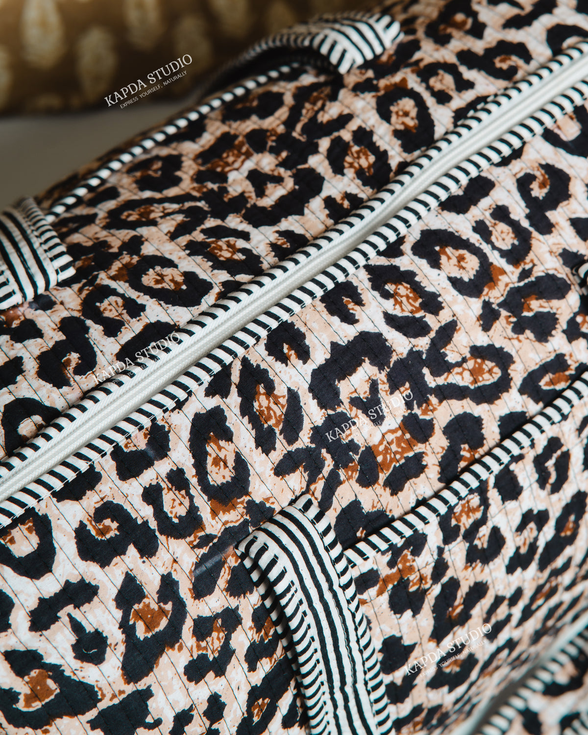 Leopard Print Quilted Duffel Bag