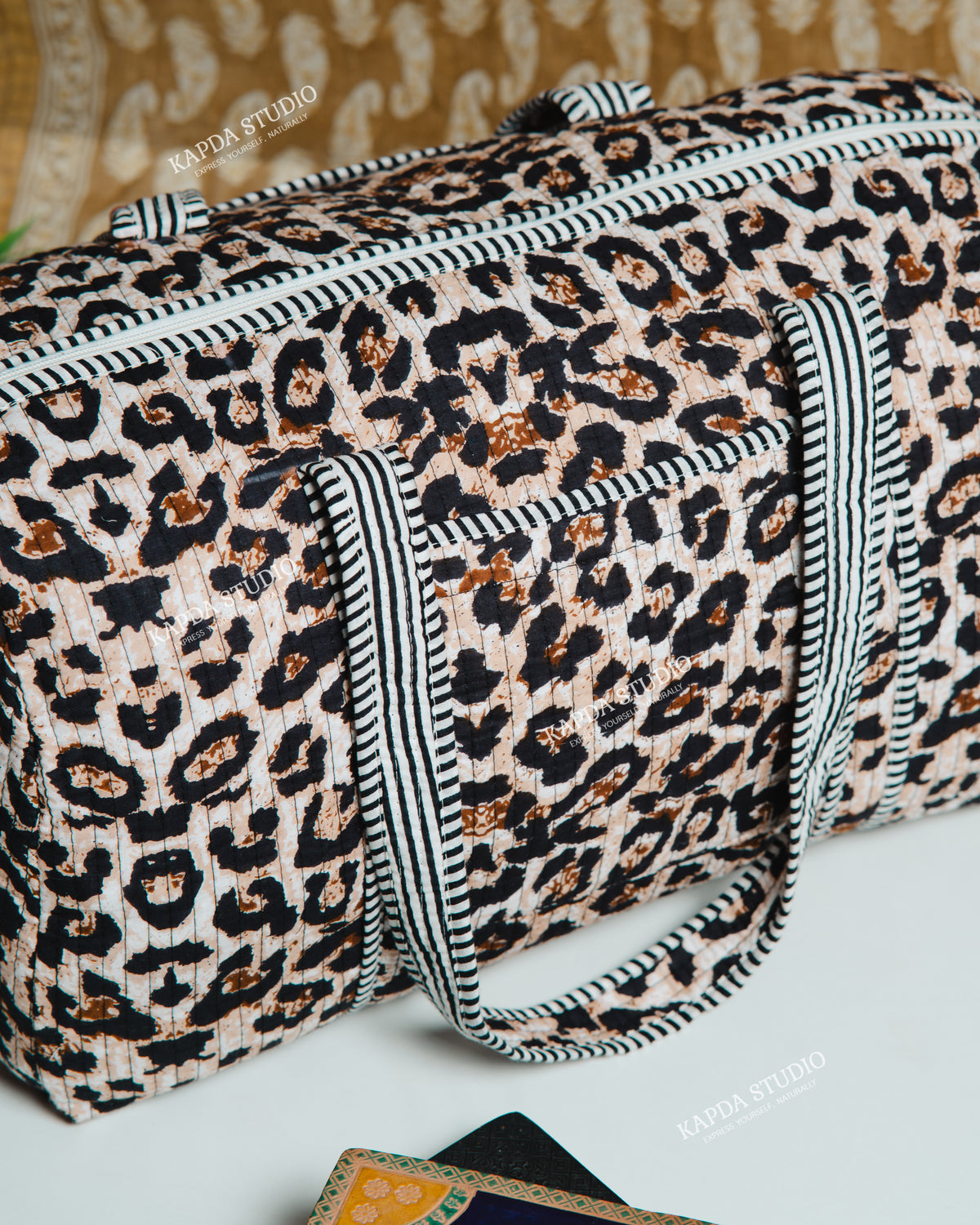 Leopard Print Quilted Duffel Bag